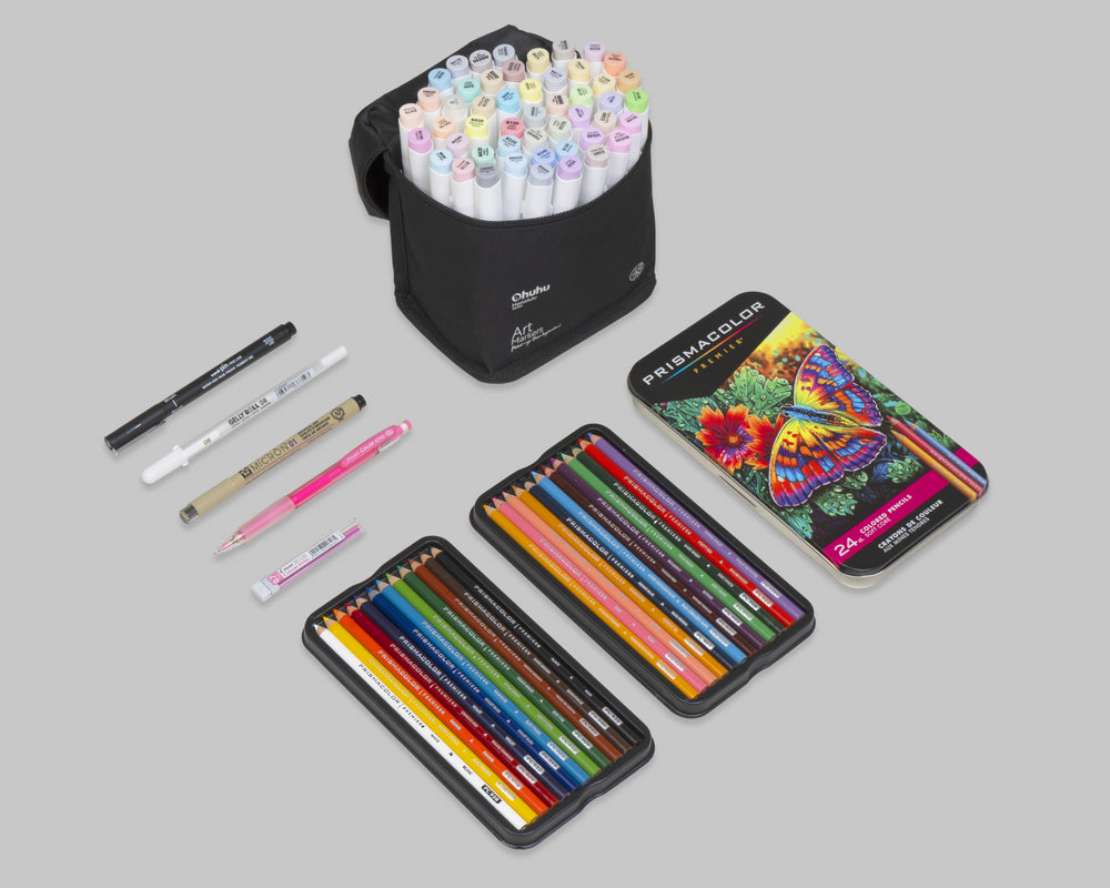 Collection of mixed media art tools included in the Gretel Lusky Art Kit